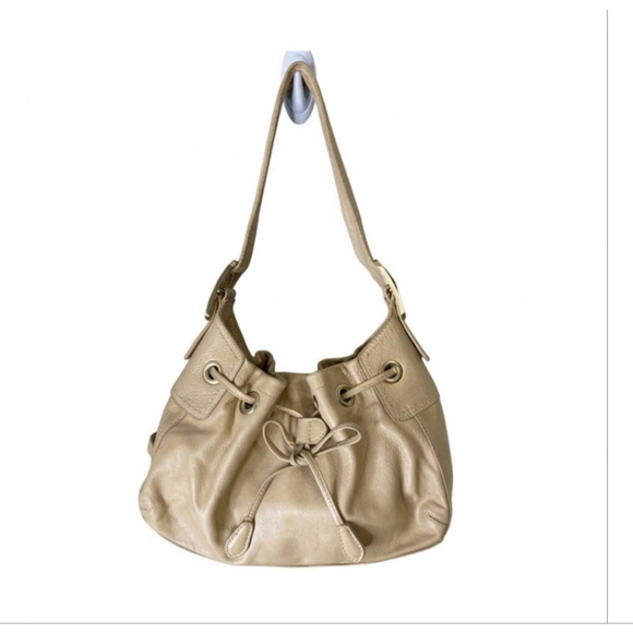 Cole Haan Handbags - Cole Haan Metallic Beige Leather Drawstring Shoulder Bag